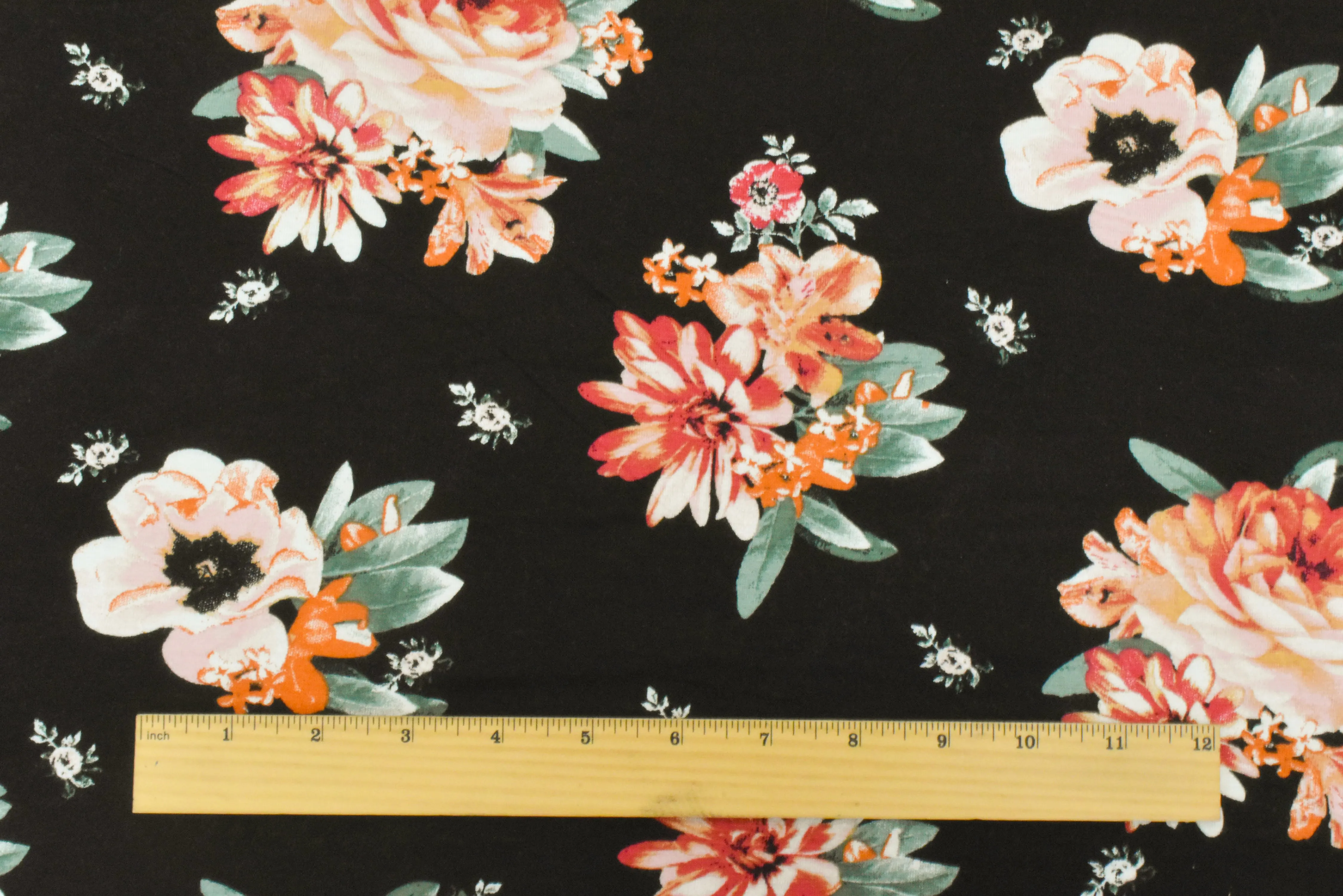 Black-Orange-Multi Floral Printed Stretch Rayon Jersey Knit Fabric